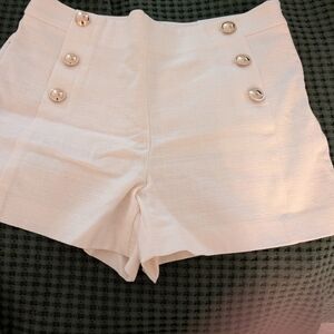 Elegant Cream Women's Shorts with Button Detail